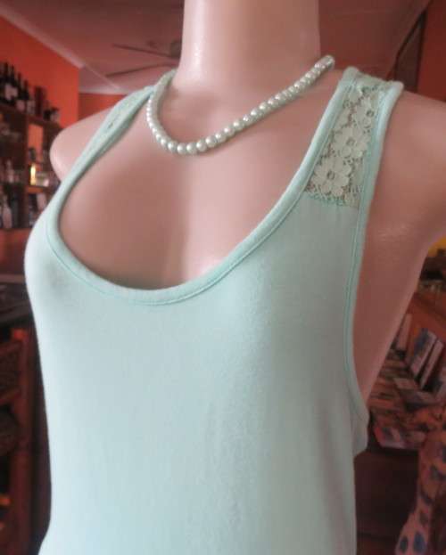 Sweet seafoam green stretch viscose with lace yoke shoulders and back .U front neckline .Size 36.