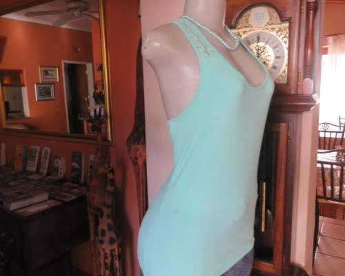 Sweet seafoam green stretch viscose with lace yoke shoulders and back .U front neckline .Size 36.