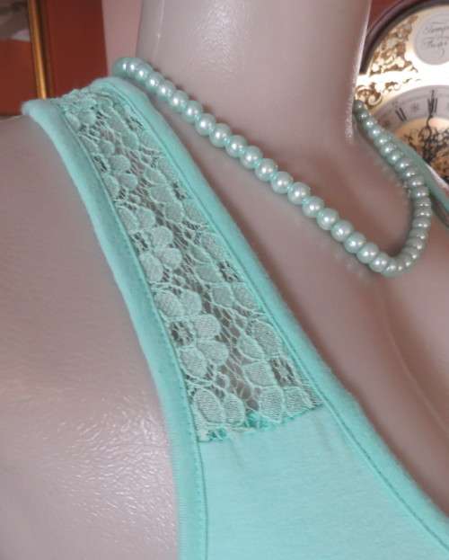Sweet seafoam green stretch viscose with lace yoke shoulders and back .U front neckline .Size 36.