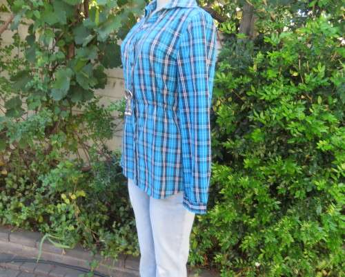 As new blue/white/navy check long button down top in 100% cotton.Waist elasticated.Size 34/10.