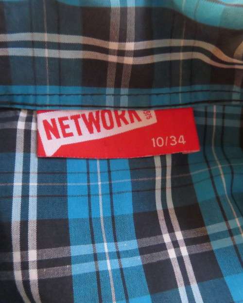 As new blue/white/navy check long button down top in 100% cotton.Waist elasticated.Size 34/10.