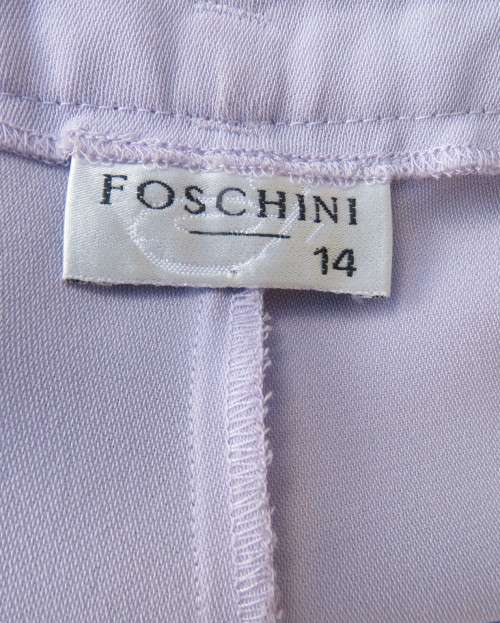 Ankle length lavender textured polyester pants with front pleats. Size 38/14 by FOSHINI. As new.