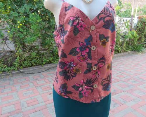 Sexy brick colour strappy top with floral patterns.Button down.Size 34 by RED.Never used.