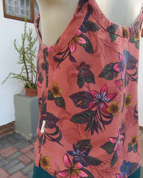 Sexy brick colour strappy top with floral patterns.Button down.Size 34 by RED.Never used.