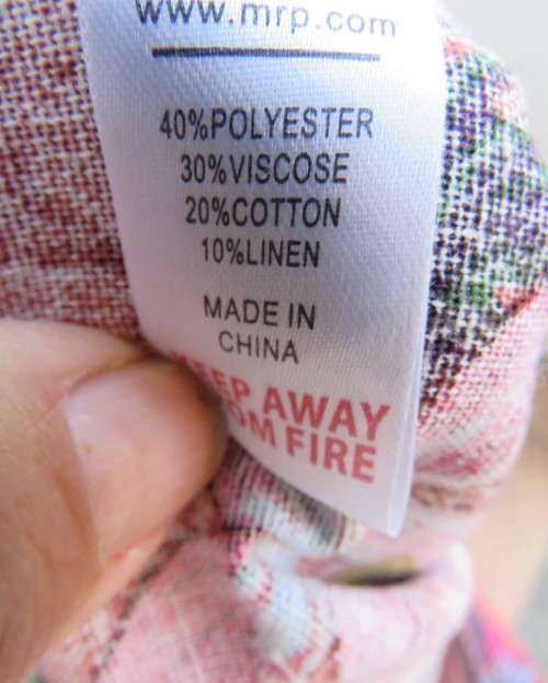 Sexy brick colour strappy top with floral patterns.Button down.Size 34 by RED.Never used.
