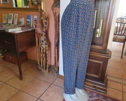 Beautiful Boutique made 2 pc polyester w/w pant suit.Navy with colourful dots.Size 40 to 42.As new
