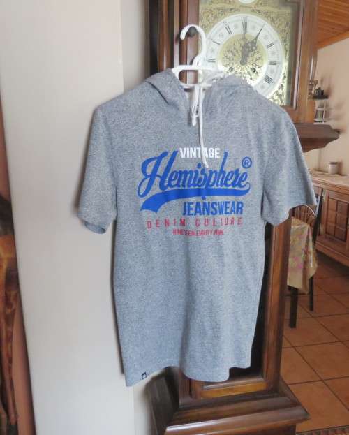 As new HEMISPHERE hooded top in grey with blue/red logo.In polycotton. For 13 to 14 yr boy,