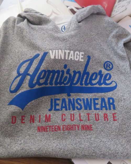 As new HEMISPHERE hooded top in grey with blue/red logo.In polycotton. For 13 to 14 yr boy,