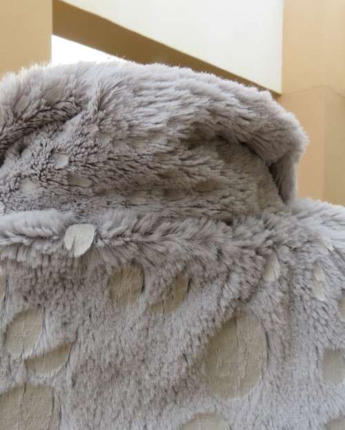 Warm,cozy silver grey fluffy polyester zip-up lined waistcoat.High neckline.Size 36 to 38.As new