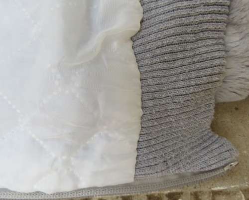 Warm,cozy silver grey fluffy polyester zip-up lined waistcoat.High neckline.Size 36 to 38.As new
