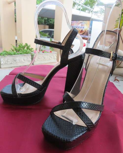 Pair of black block heel faux snake skin shoes. Ankle straps and straps over feet.Size 3.5.As new