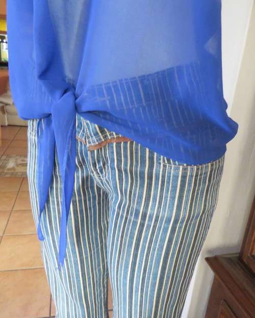 Chic little royal blue sheer polyester slip over top with cut-on sleeves.Size 36/38.By KINGS BABY.
