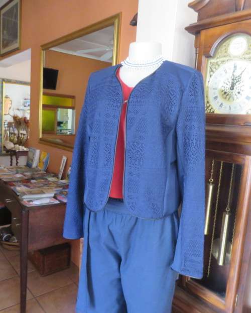 Beautiful navy cropped jacket size 40/16 by OR.Stretch polyester fabric and lace.Collarless.As new