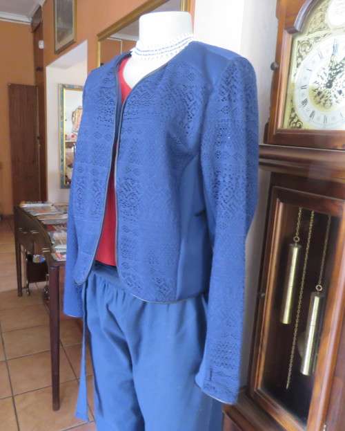 Beautiful navy cropped jacket size 40/16 by OR.Stretch polyester fabric and lace.Collarless.As new