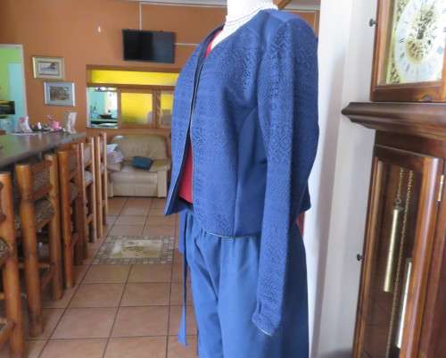 Beautiful navy cropped jacket size 40/16 by OR.Stretch polyester fabric and lace.Collarless.As new