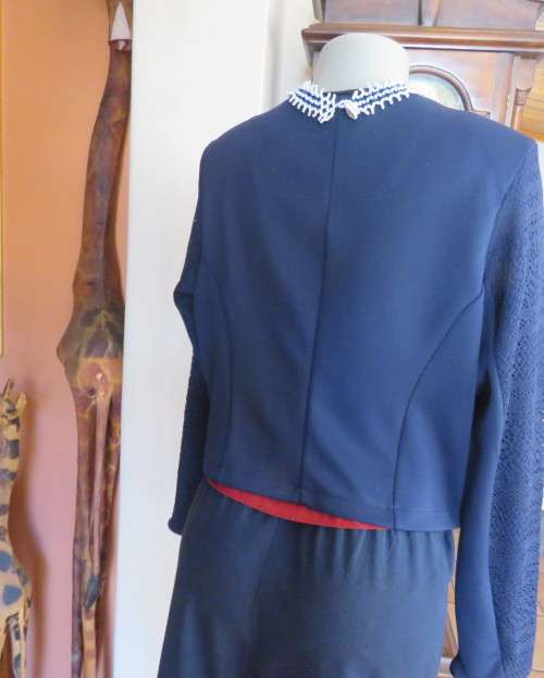 Beautiful navy cropped jacket size 40/16 by OR.Stretch polyester fabric and lace.Collarless.As new