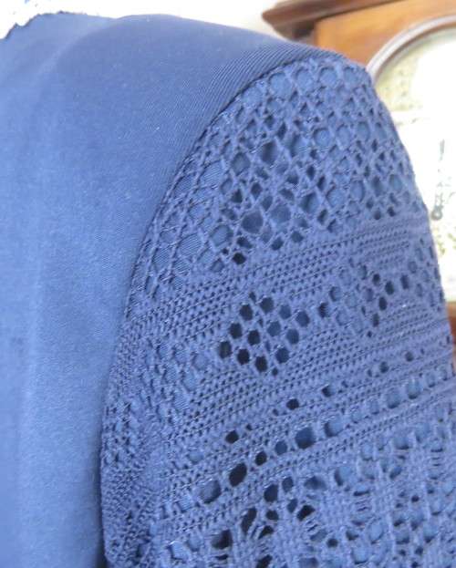 Beautiful navy cropped jacket size 40/16 by OR.Stretch polyester fabric and lace.Collarless.As new