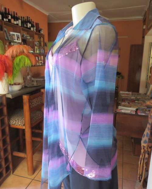 Striking sheer polyester open long sleeve top in blues and purples. Long fronts to tie.Size 38 to 40