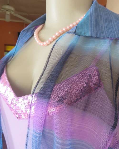 Striking sheer polyester open long sleeve top in blues and purples. Long fronts to tie.Size 38 to 40