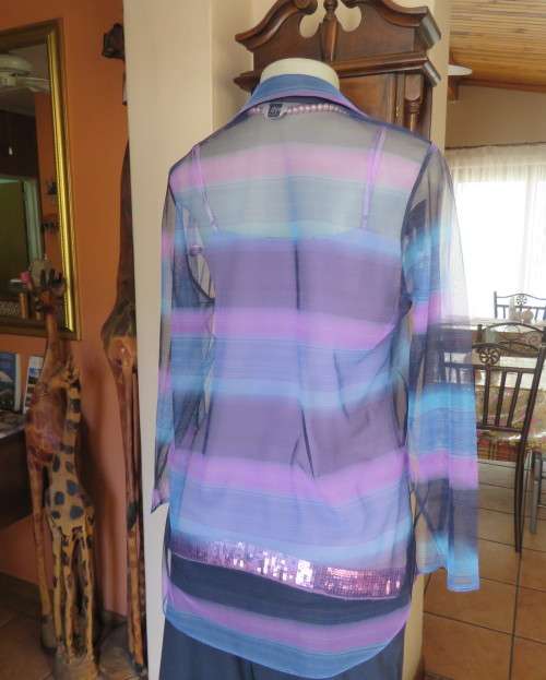 Striking sheer polyester open long sleeve top in blues and purples. Long fronts to tie.Size 38 to 40