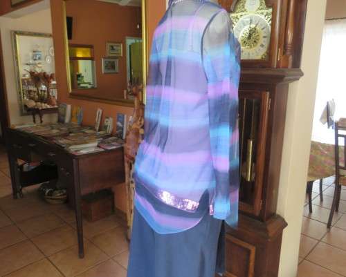 Striking sheer polyester open long sleeve top in blues and purples. Long fronts to tie.Size 38 to 40