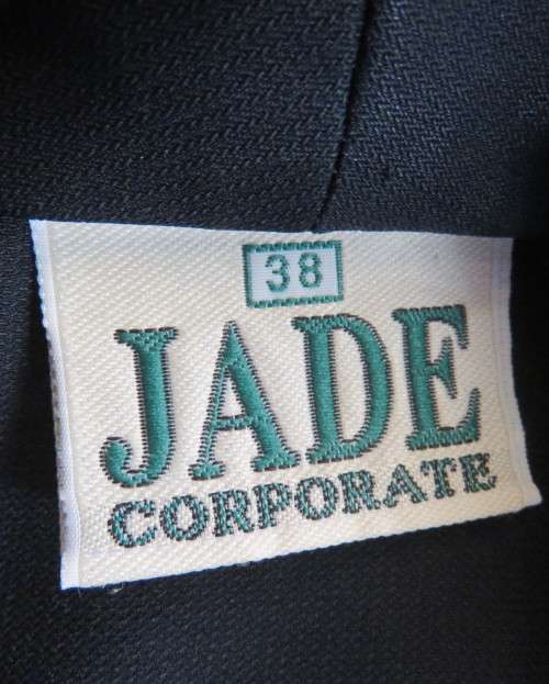 Stunning navy short sleeve 2 button closure polyester jacket. Size 38/14 by JADE. New condition.