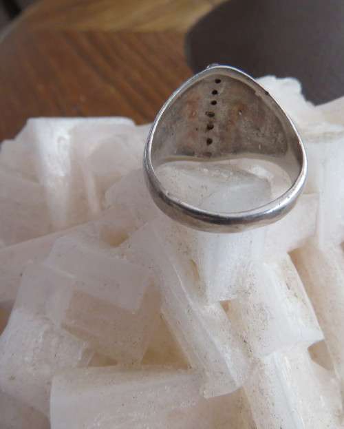 Handsome men`s 925 silver size 9.5 uniquely styled ring. With narrow black stone. New condition.