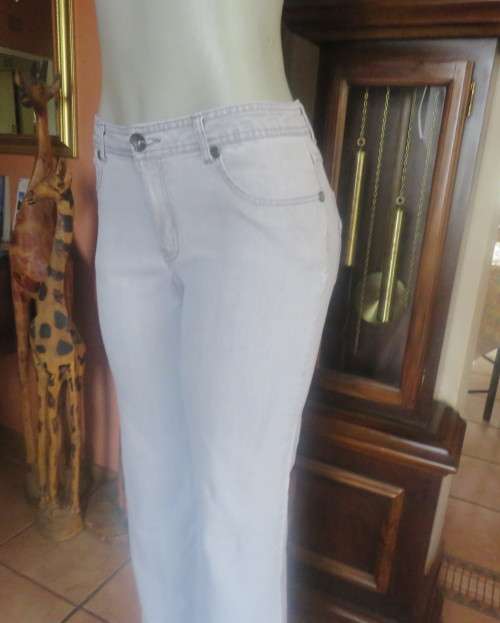 Straight legged cloud blue low rise denim jeans in stretch polycotton size 34/10. As new.