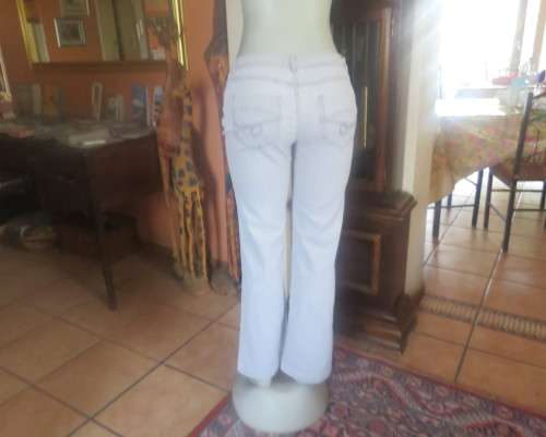 Straight legged cloud blue low rise denim jeans in stretch polycotton size 34/10. As new.