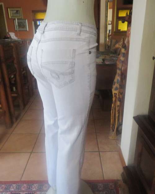Straight legged cloud blue low rise denim jeans in stretch polycotton size 34/10. As new.