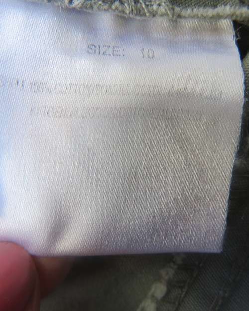 Vintage authentic 100% cotton. Wash out distressed look.Sage green.Pockets and stitching galore. 34.
