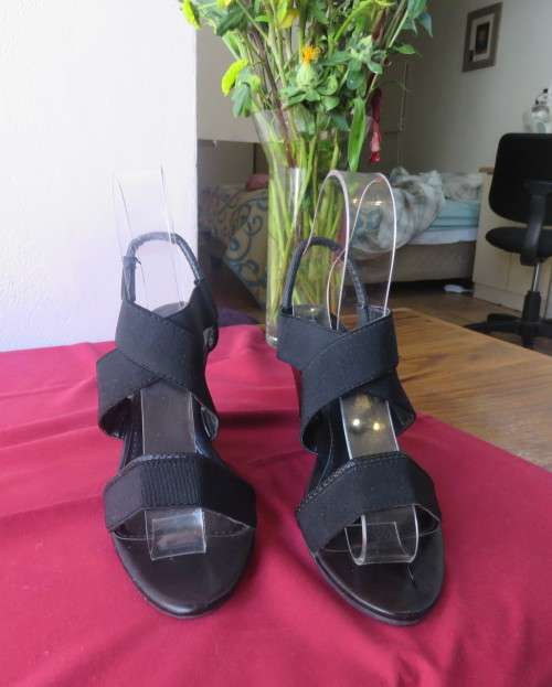 Pair black wedge heel sandals with ankle and crossover straps. Open toes.Size 5 by MRP.As new