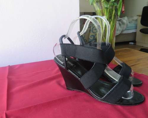 Pair black wedge heel sandals with ankle and crossover straps. Open toes.Size 5 by MRP.As new