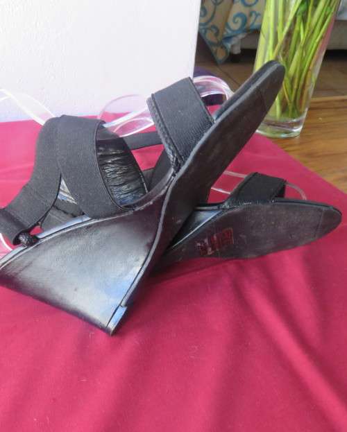 Pair black wedge heel sandals with ankle and crossover straps. Open toes.Size 5 by MRP.As new