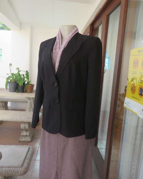 Brand new elegant very black long sleeve jacket by WOOLWORTHS size 36/12.Front pockets.Never used.
