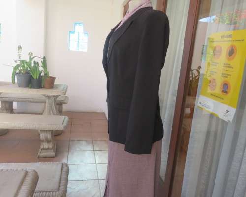 Brand new elegant very black long sleeve jacket by WOOLWORTHS size 36/12.Front pockets.Never used.
