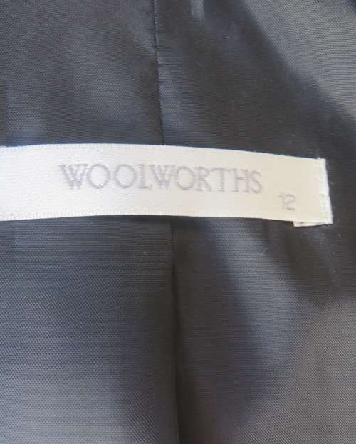 Brand new elegant very black long sleeve jacket by WOOLWORTHS size 36/12.Front pockets.Never used.