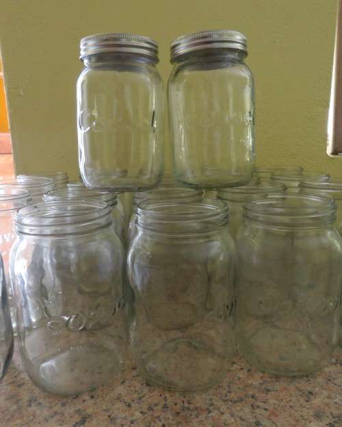 23 x Consul 1Litre preserve jars with new metal domes and lids. From late 80`s New condition.