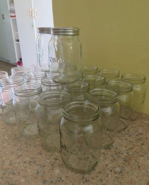 23 x Consul 1Litre preserve jars with new metal domes and lids. From late 80`s New condition.