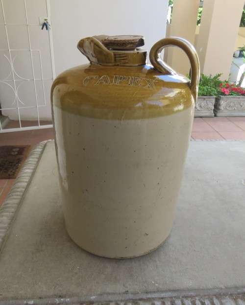 Vintage CAPEX glazed stonewear jug with stopper. Height 36cm. Diameter 23cm. Very good condition.