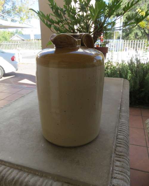 Vintage CAPEX glazed stonewear jug with stopper. Height 36cm. Diameter 23cm. Very good condition.
