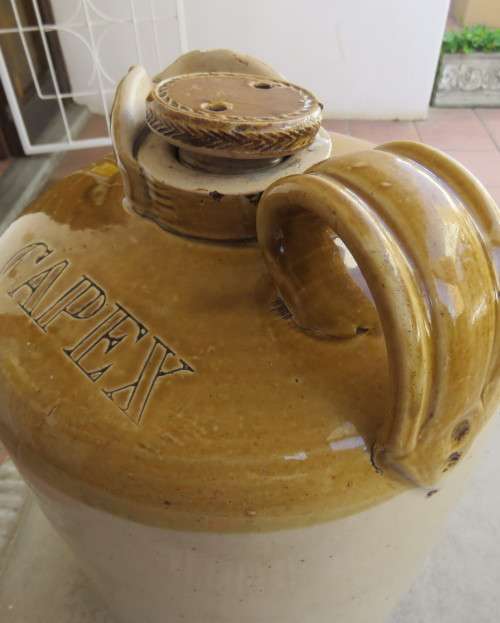 Vintage CAPEX glazed stonewear jug with stopper. Height 36cm. Diameter 23cm. Very good condition.