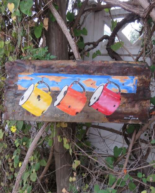 Interesting junk art by DEON ASSUR 2012. Painting of 3 enamel mugs on rusted plate.Size 58 x 25cm.