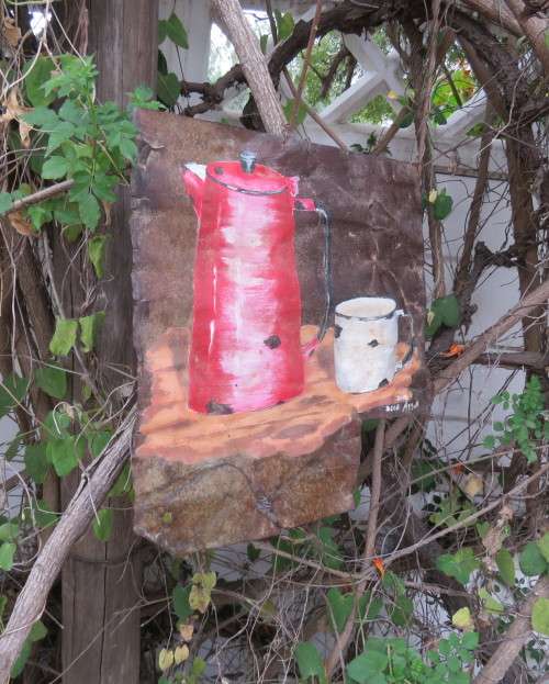 Unique junk art by DEON ASSUR 2012 on rusted metal. Red coffee pot with white mug.Size 36cm x 36cm