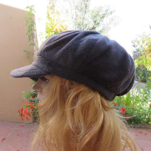 Warm grey brushed polyester octagonal ladies beret cap with elastic at back. Lined. As new.