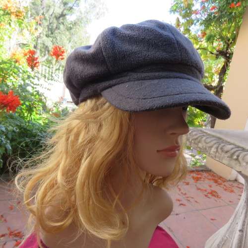 Warm grey brushed polyester octagonal ladies beret cap with elastic at back. Lined. As new.