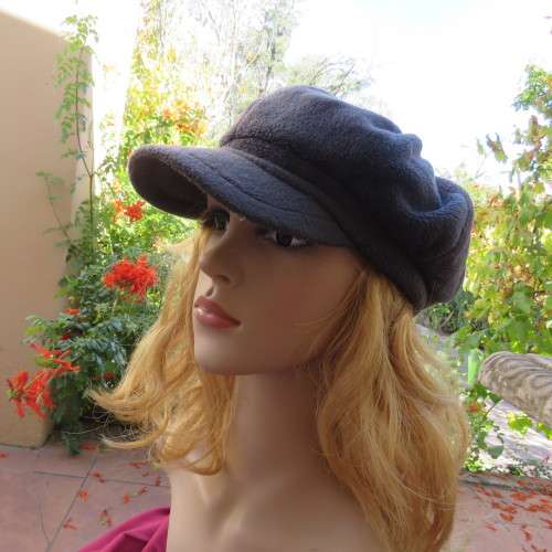 Warm grey brushed polyester octagonal ladies beret cap with elastic at back. Lined. As new.