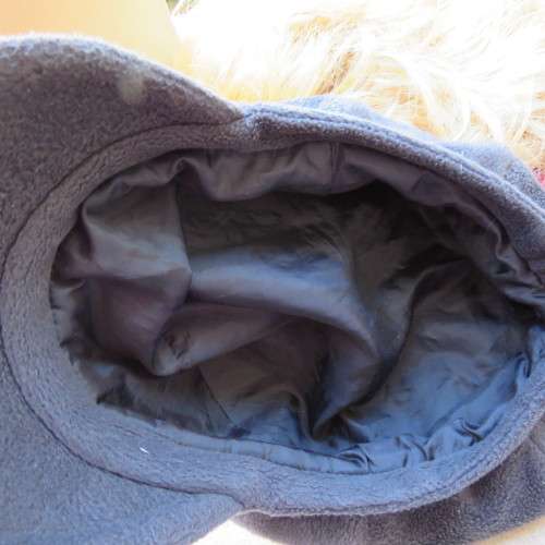 Warm grey brushed polyester octagonal ladies beret cap with elastic at back. Lined. As new.