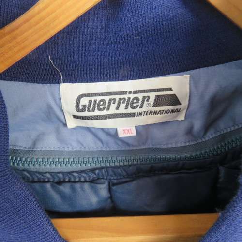 Men`s GUERRIER Int. steel blue Mercedes Benz windbreaker size XXL. Zip up front. Padded inner.