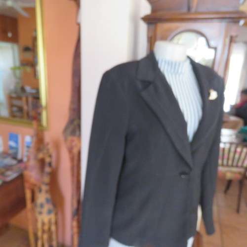 High class black OASIS long sleeve lined jacket. Stitching detail.One button closure.Size 36.As new.